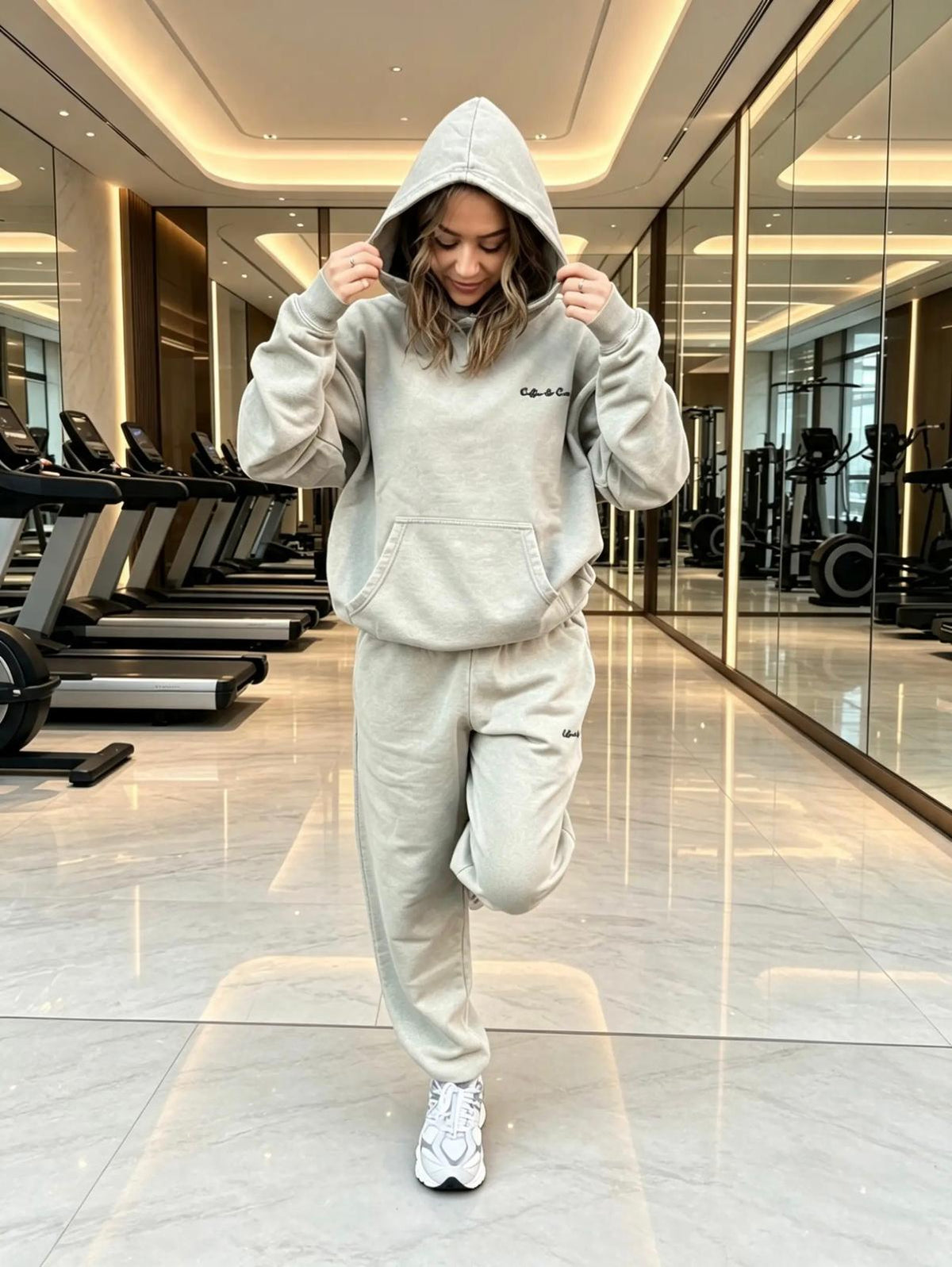coffee caviar grey tracksuit in gym